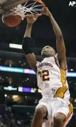 Taj Gibson dunks against USC.