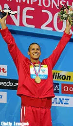 Ous Mellouli celebrates his gold in the 800 free at the 2007 World Championships.
