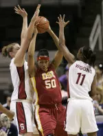 Southern Cal's Chloe Kerr, center, is defended by Stanford's Jayne Appel, left, and Candice Wiggins during the first half of a semifinal game in the Pac-10 college basketball tournament in San Jose, Calif., Sunday, March 4, 2007. (AP Photo/Marcio Jose Sanchez)