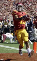Southern California cornerback Kevin Thomas scores on an interception against Arizona State during the first half. (AP Photo/Chris Carlson)