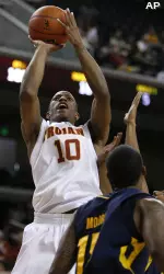 DeMar DeRozan fires a jumpshot in the Trojans' rout of UC Irvine. (AP Photo/Danny Moloshok)