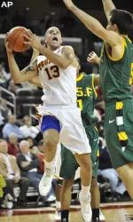 Daniel Hackett shoots over San Francisco guard Chris O'Brien during the second half.