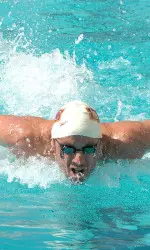 Senior Bryce Elser competed in both relays for the Trojans Wednesday.