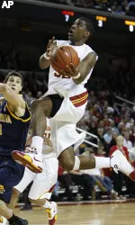 O.J. Mayo soars to the hoop. (AP Photo/Gus Ruelas)