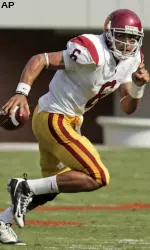 Southern California quarterback Mark Sanchez (6) looks for a receiver during a college football game against Virginia. (AP Photo/Steve Helber)