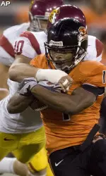 Oregon State Jacquizz Rodgers is tackled from behind by USC's Brian Cushing. (AP Photo/Don Ryan)