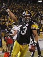 Troy Polamalu celebrates his 40-yard interception return for a touchdown in the AFC Championship game. (AP Photo/Rob Carr)