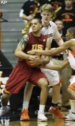 USC's Daniel Hackett fights for the ball with Oregon State's Josh Traver.