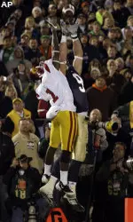 Notre Dame tight end Kyle Rudolph, right, and Southern California cornerback T.J. Bryant go up for the ball in the end zone with four seconds remaining.