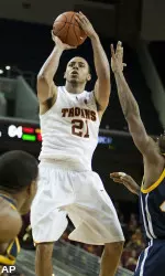 Senior Dwight Lewis has averaged 12.4 points through USC's first eight games and continues to climb up the Trojans' all-time scoring list.