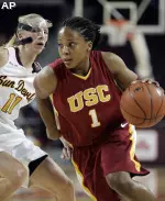 Camille LeNoir drives to the hoop. She scored 18 points against ASU. (AP Photo/Reed Saxon)