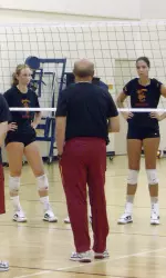 USC head women's volleyball coach Mick Haley talks to his team Monday morning during the start of the 2009 fall camp