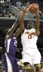Marcus Johnson (0) shoots over Washington's Justin Holiday, left, in the second half.