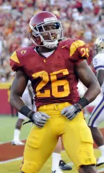 (AP)Running back Marc Tyler (26) celebrates his touchdown during the first half.
