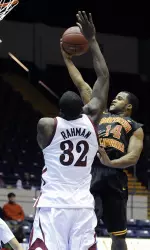 Southern California's Donte Smith shoots over New Mexiso State's Hamidu Rahman in the first half.
