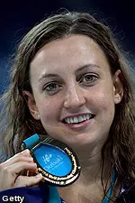 Rebecca Soni, showing off her gold medal after winning the 50m breast at the Short Course World Championships Thursday in Dubai, UAE.