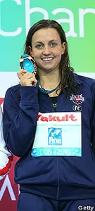 Rebecca Soni holds up her gold medal after winning the 200m breaststroke Sunday at the Short Course World Championships.