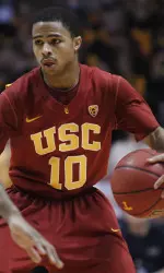 Southern California's Maurice Jones (10) works the ball against Tennessee's Melvin Goins (2) during the second half.
