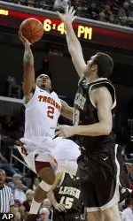 Southern California's Jio Fontan drives to the basket under pressure from Lehigh's Kevin McCarthy.