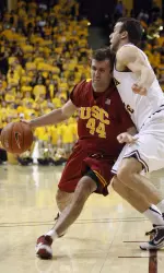 Southern California's Mike Gerrity drives on Arizona State's Derek Glasser.