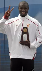 Junior Oscar Spurlock shown here with the award he received for finishing fourth in the 110m hurdles today at the NCAA Championships.