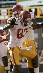 Southern California receiver Ronald Johnson celebrates a touchdown with teammate Butch Lewis.