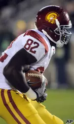 USC tight end Randall Telfer makes a catch for a touchdown in the first quarter.