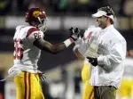 Xavier Grimble and Lane Kiffin.