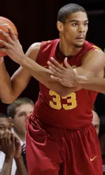 Southern California forward Garrett Jackson (33) looks for room around Stanford forward Josh Owens (13) in the first half.