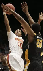 Southern California guard Maurice Jones drives against Virginia Commonwealth guard Bradford Burgess.
