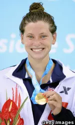 Haley Anderson displays her gold medal after winning the 1500m free at the 2011 World University Games on Thursday in Shenzhen, China.