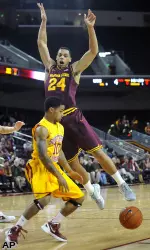 USC guard Maurice Jones strips the ball from Arizona State guard Trent Locket