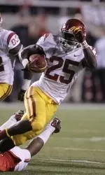 Silas Redd runs the ball against Utah.