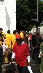 Trojans passing out food, clothing and socks to those on Skid Row.
