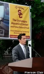 Former walk-on swimmer and 1983 swim captain Fred Uytengsu speaks at today's groundbreaking.