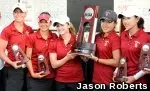 USC holds up its second-place trophy.