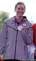Haley Anderson displays her silver medal won in the Olympic Marathon 10K