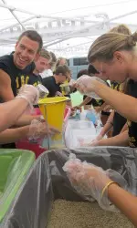 The sophomores work together to pack a meal and fight hunger.
