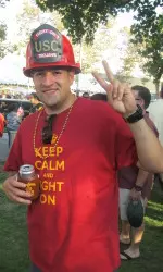 An LAFD fireman celebrates the Wounded Warrior Tailgate.