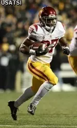 Javorius Allen carries the ball.