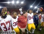 Javorius Allen, Jahleel Pinner, Ed Orgeron, Leonard Williams (left to right)