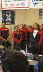 Coach Cooper-Dyke addresses the kids.