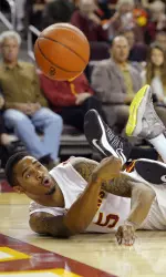 Ari Stewart passes the ball from the court. (AP Photo/Mark J. Terrill)