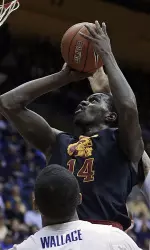 Dewayne Dedmon shoots over California's Richard Solomon (35) and Tyrone Wallace during the first half. (AP Photo/Ben Margot)