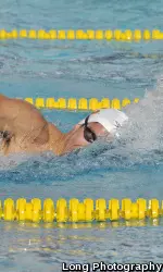Sophomore Cristian Quintero edged junior Dimitri Colupaev for the Pac-12's 200y free title Tuesday.