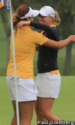 Junior Sophia Popov congratulates Annie Park after the freshman won the 2013 Pac-12 individual title on Wednesday. Popov was second, two strokes back.