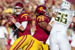 Khaled Holmes (78) blocking for Matt Barkley.