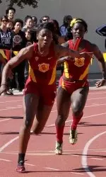 Akawkaw Ndipagbor hands off to Jessica Davis in the relay.