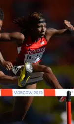 Nia Ali fought through leg cramps to advance to the women's 100m HH semifinals tomorrow.