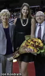 Three-time All-American middle blocker Emily Adams had her No. 9 raised to the rafters at the Galen Center.